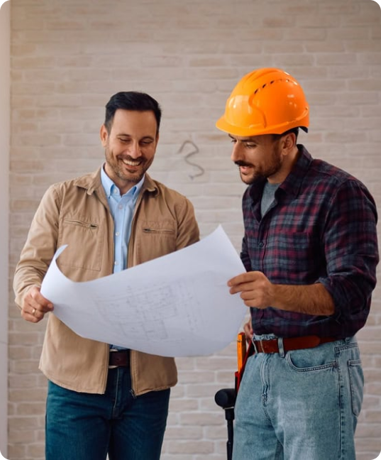 Two men reviewing construction plans | LocalSink